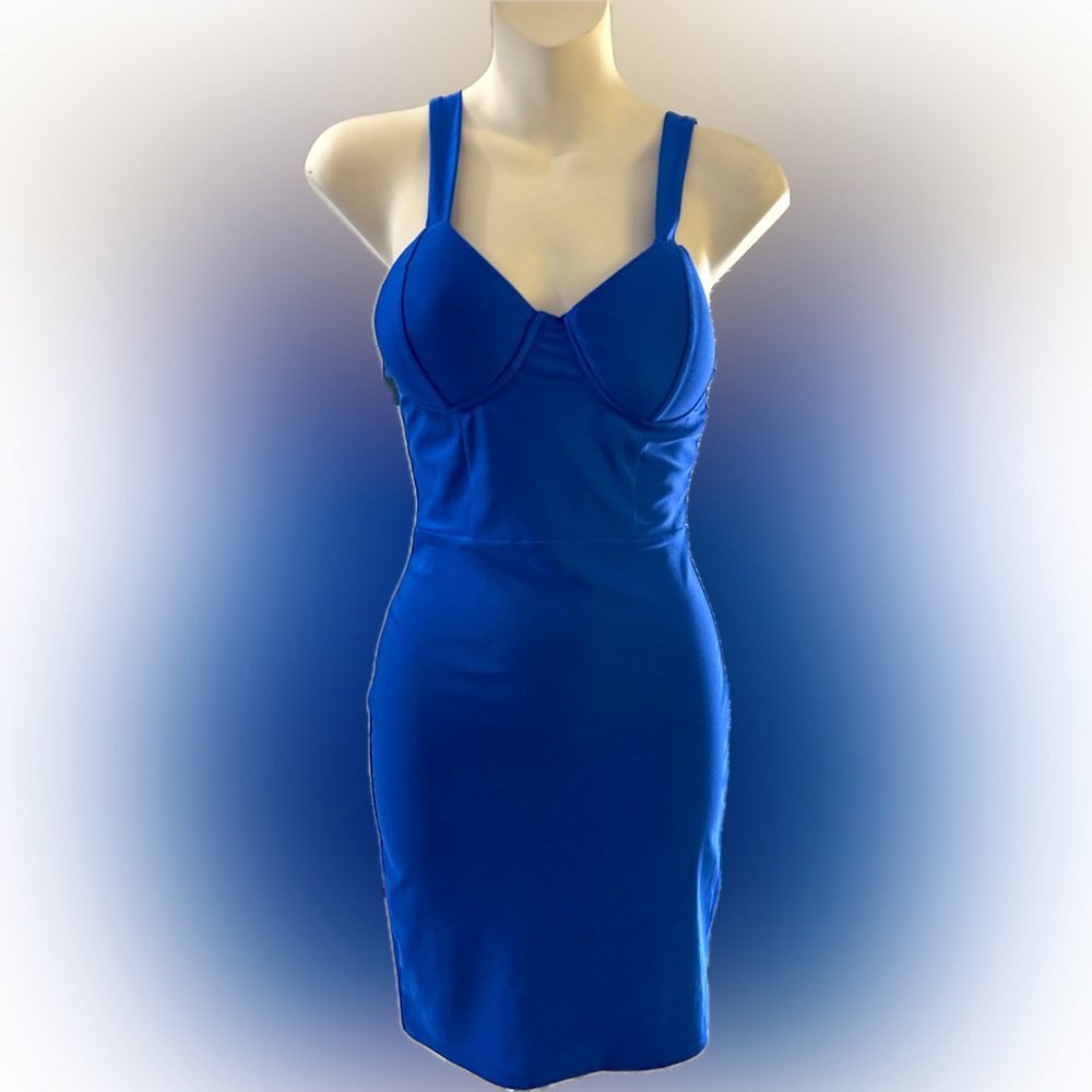 Body hugging bondage dress , push up padded bra.